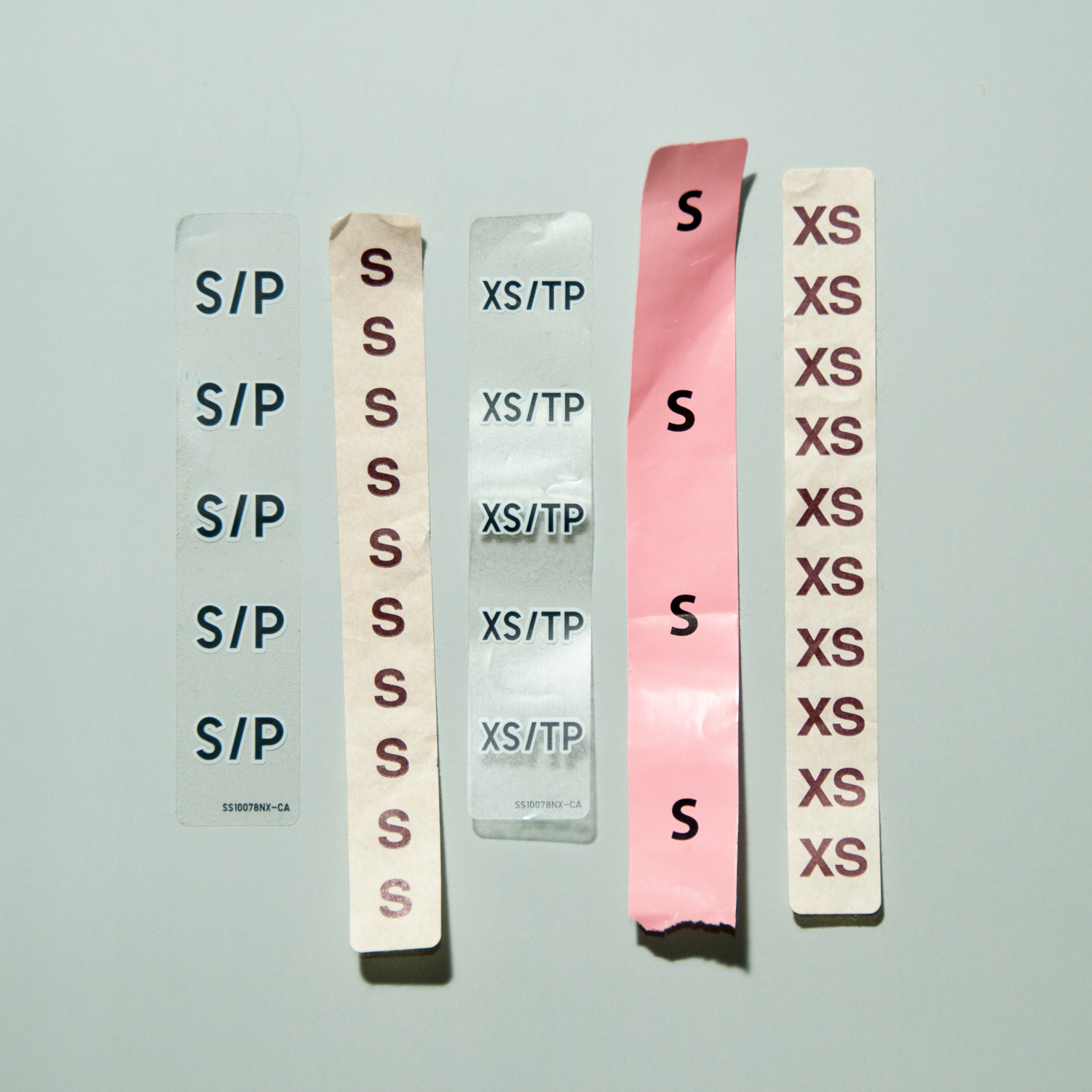 a collection of long sticker size labels